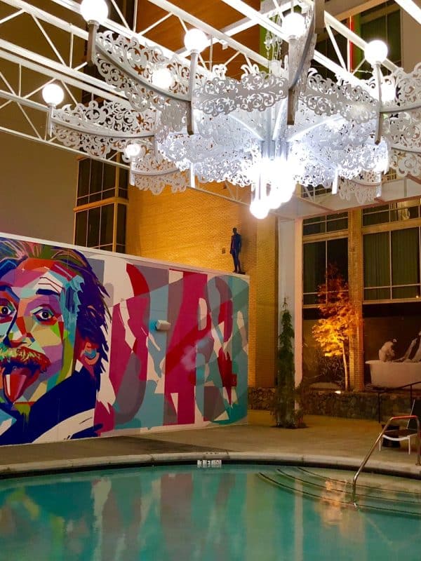 The pool at night showing the Albert Einstein mural